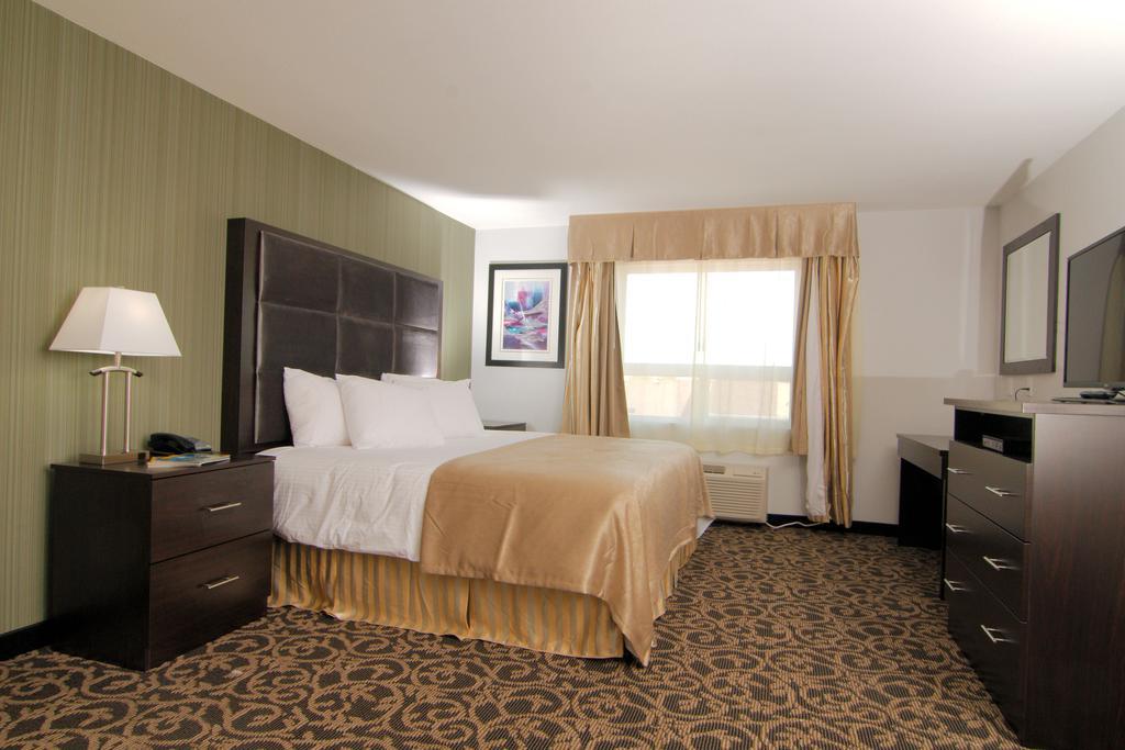 Paradise Inn&Suites Redwater Ruang foto
